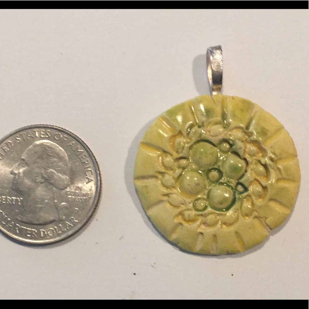 Aromatherapy clay fired pendant